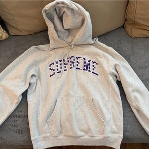 Supreme Light Gray Hoodie with Purple Text